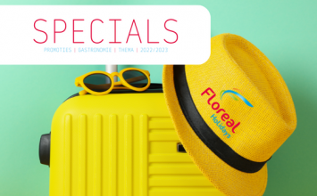Cover specials brochure met Hoed, zonnebril en reiskoffer